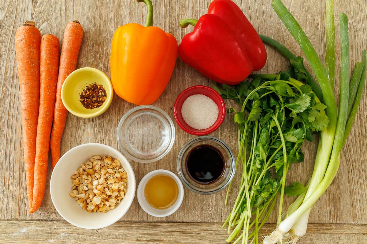 Spicy Korean Carrot Salad packs so much flavor into one crowd-pleasing side dish. The easy dressing melds the whole salad together in minutes. vegetable and spices for making side dish